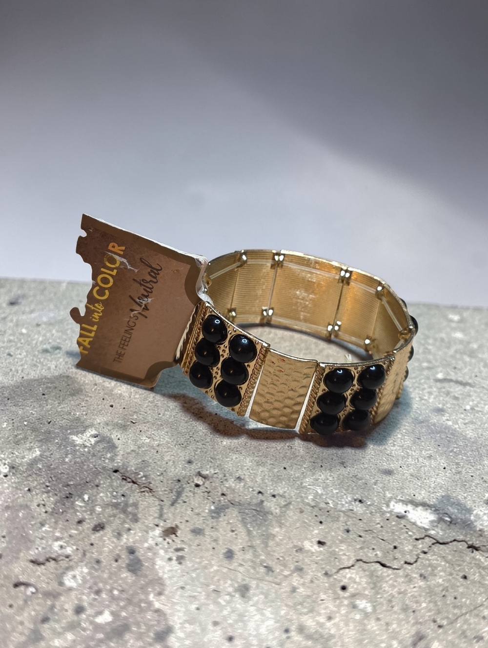 Gold Stretch Bracelet with Black Bead Accents